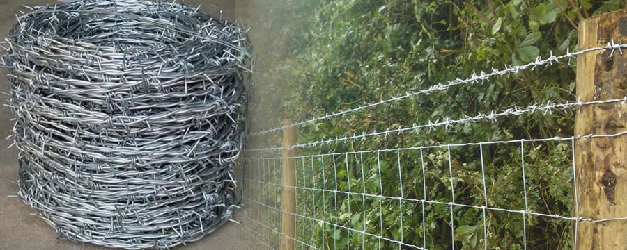 Hinge Joint Woven Wire Netting Installed with Top Lines of Hot Dip Galvanised Barbed Wire