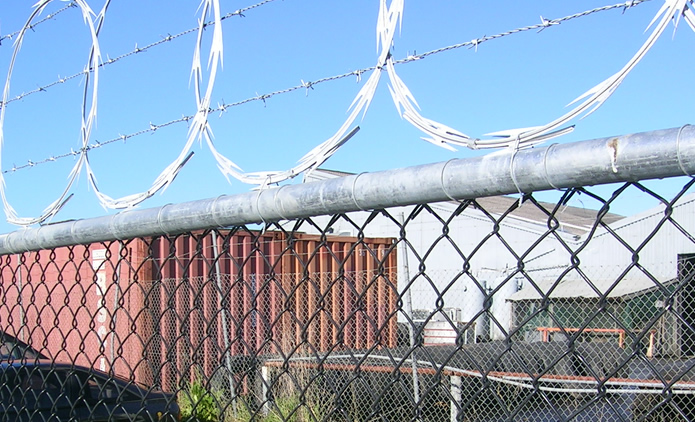 Barbed wire and galvanized chain link fence system